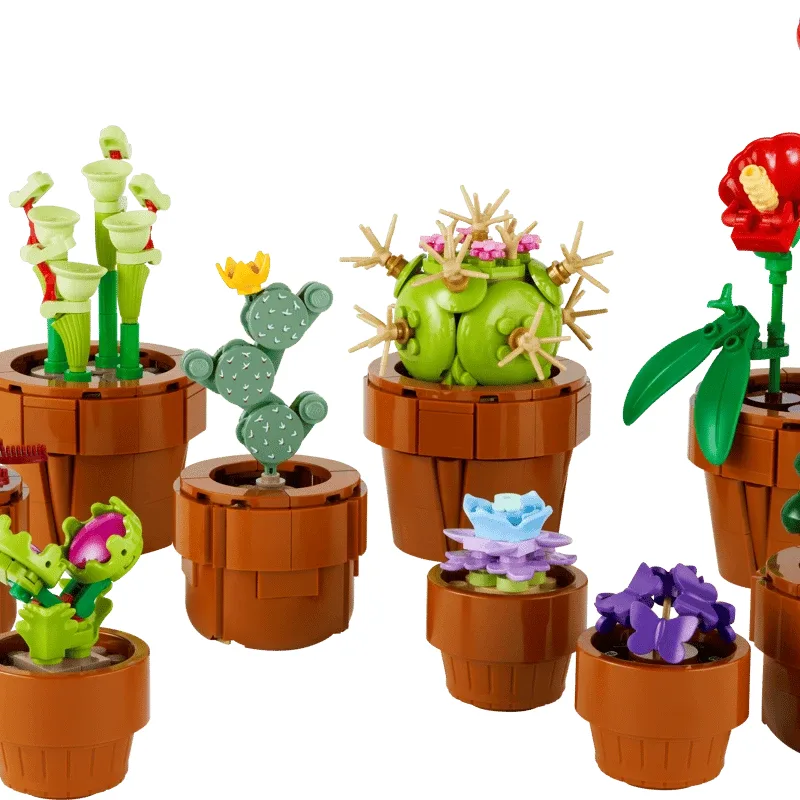 LEGO Botanicals Tiny Plants 10329: nine small brick-built plants in terracotta pots, including cacti, a pitcher plant and a purple flower