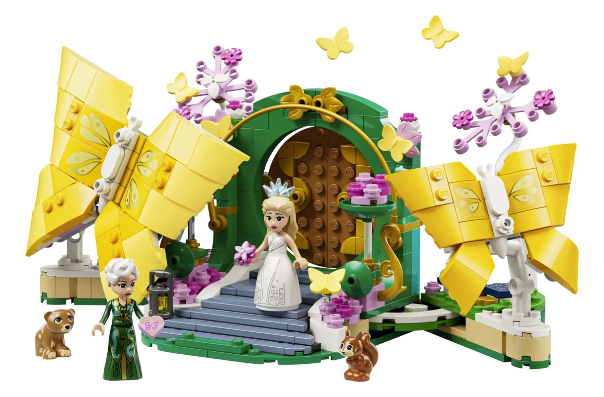 LEGO Wicked Glinda's Wedding Day 75688, two giant yellow brick-built butterfly wings opening onto a green and pink wedding scene with minifigures