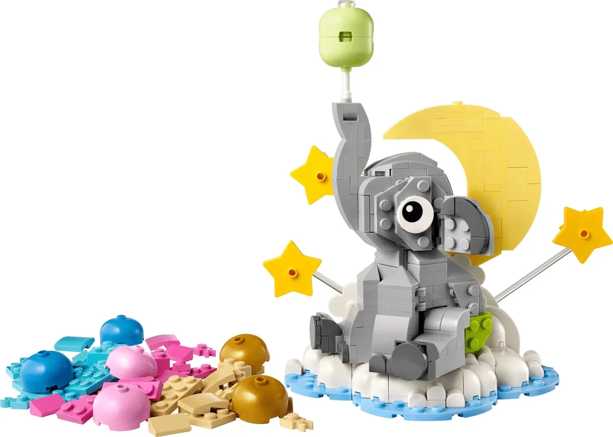 LEGO Baby Elephant in the Sky 40814, a grey elephant on a cloud with a yellow moon, stars and a green balloon