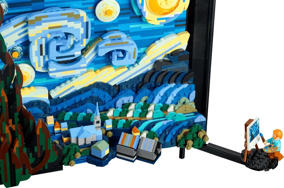 LEGO Ideas Vincent van Gogh The Starry Night 21333, the framed 3D painting with its blue swirling sky and the Van Gogh minifigure at an easel