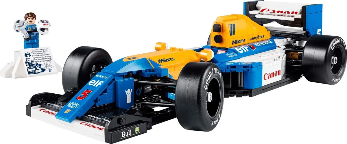 LEGO Icons Williams Racing FW14B 10353, a blue, yellow and white F1 car with a Nigel Mansell minifigure on a small stand
