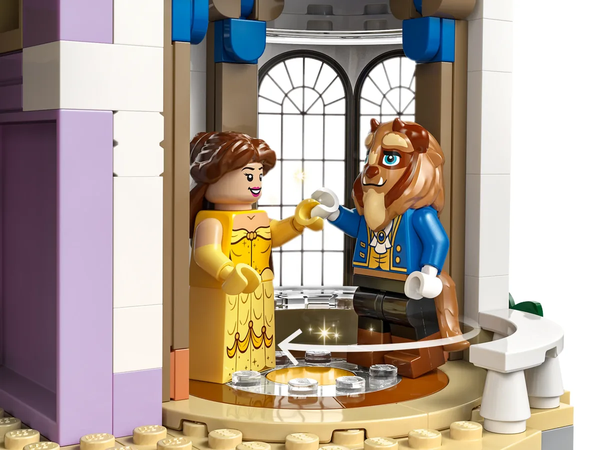 Close-up of the Belle and Beast minifigures facing each other on the turntable floor of the LEGO Beauty and the Beast Castle 43263 ballroom