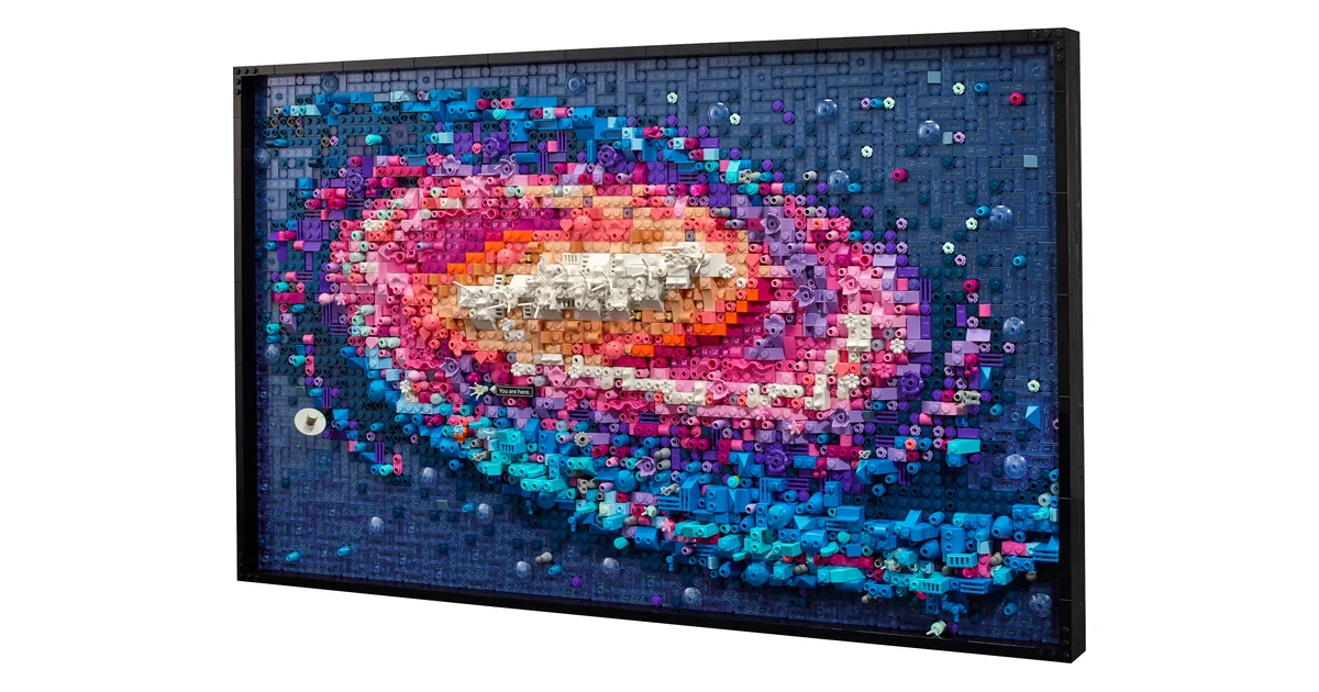 LEGO Art The Milky Way Galaxy 31212, a framed brick mosaic of a spiral galaxy in pink, orange, white and blue on a dark blue background