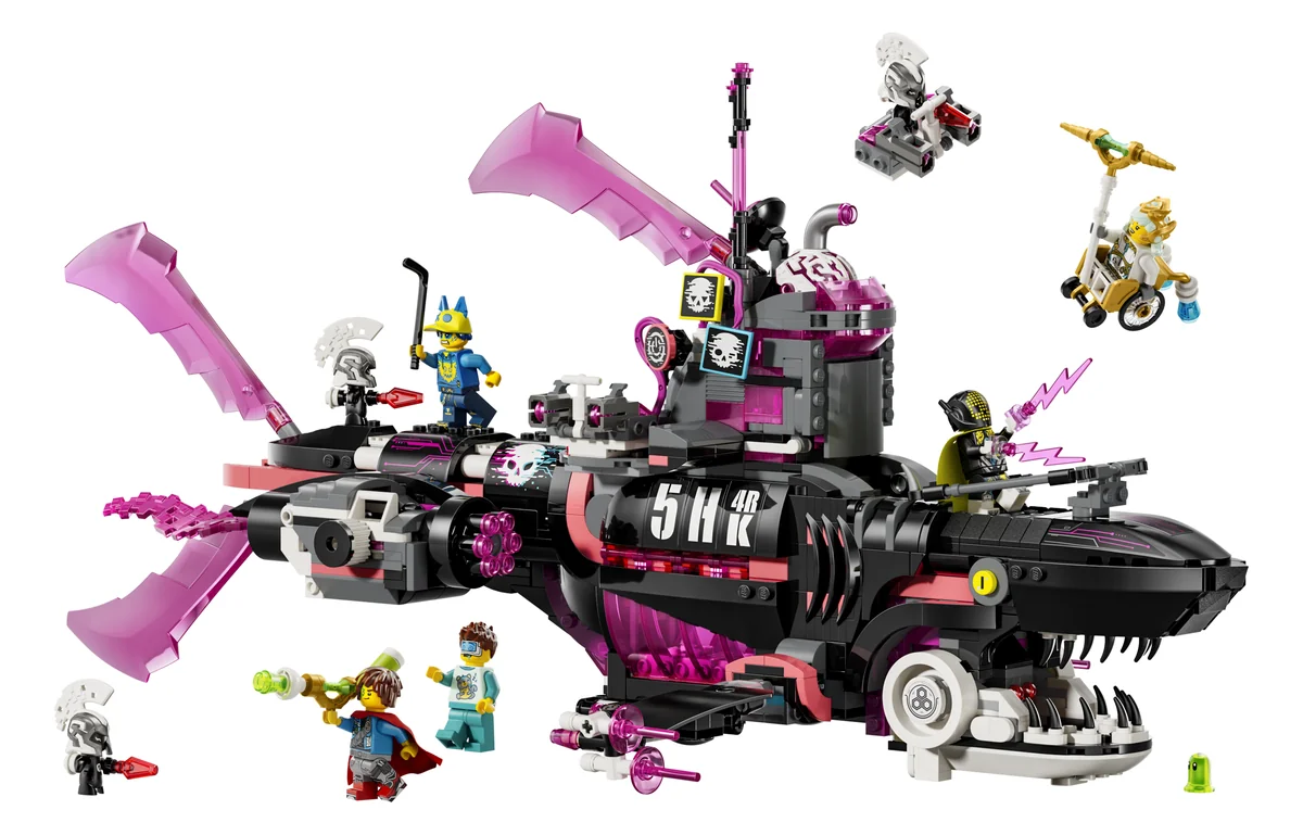 LEGO DREAMZzz Nightmare Shark Submarine 71500, a black and pink shark submarine with fins, a skull flag and minifigures around it