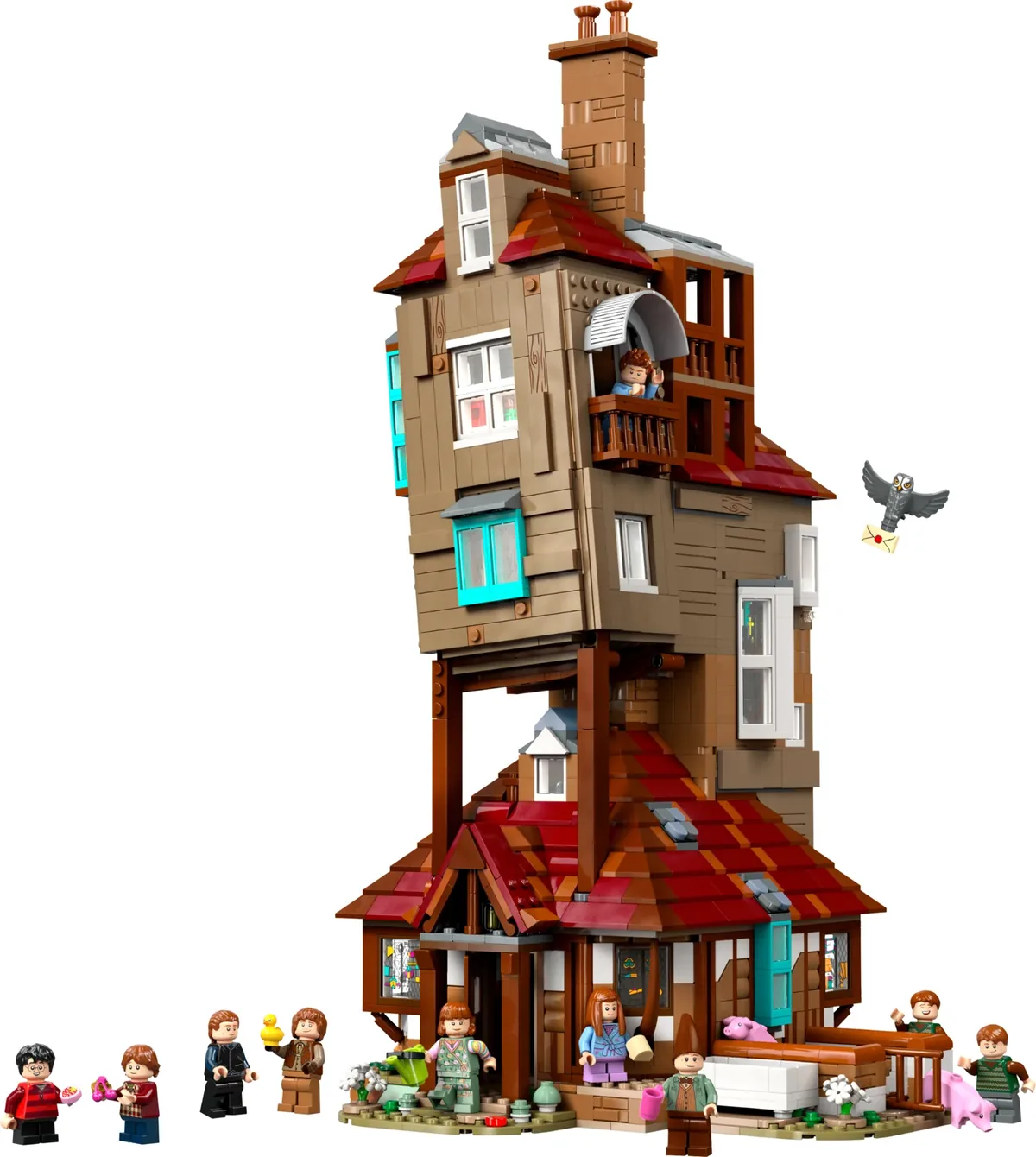 LEGO Harry Potter The Burrow Collectors' Edition 76437: the tall crooked Weasley house with an owl flying beside it and minifigures in front