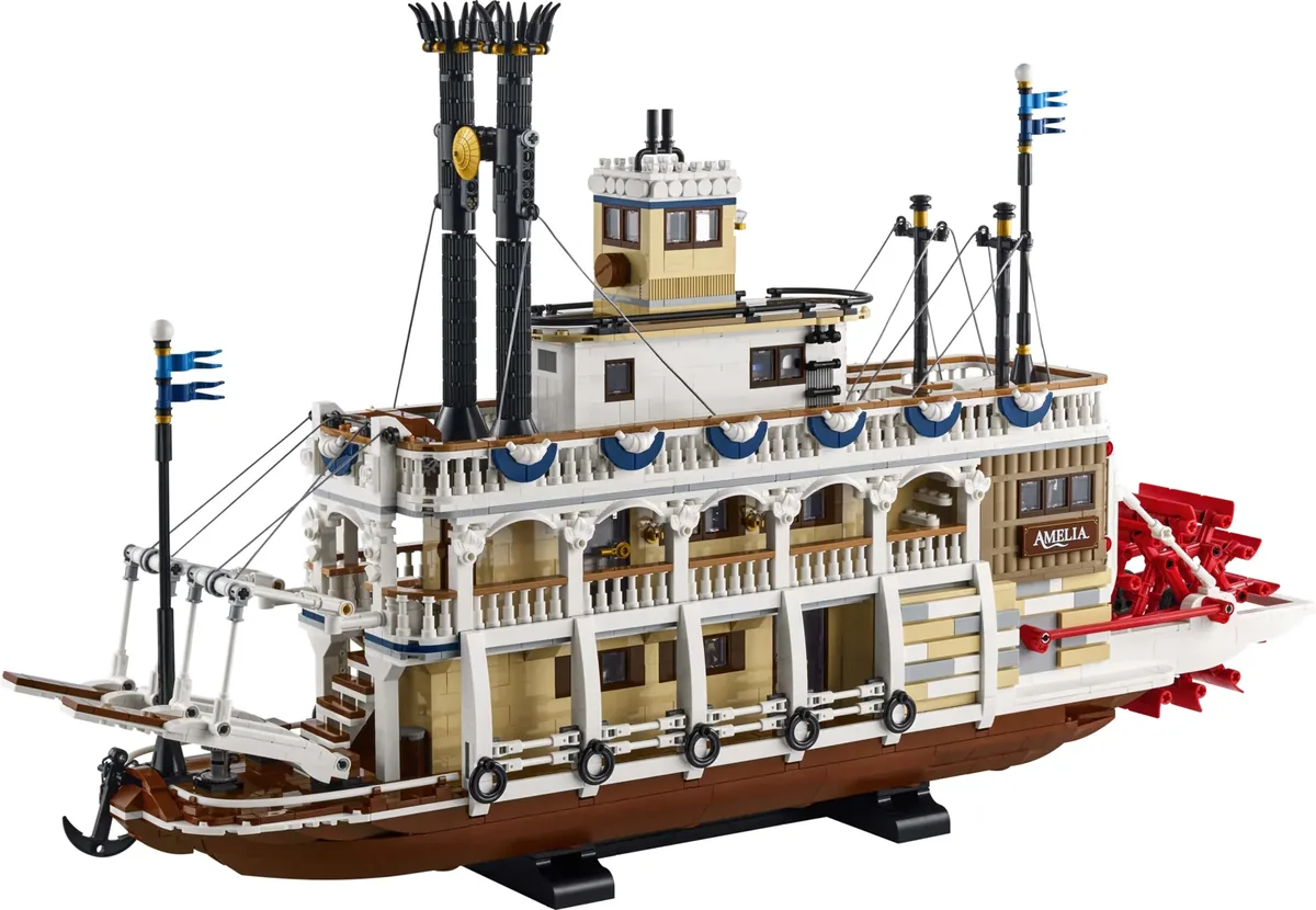 The LEGO Ideas River Steamboat 21356, a white and cream paddle steamer with twin black funnels and a red paddle wheel