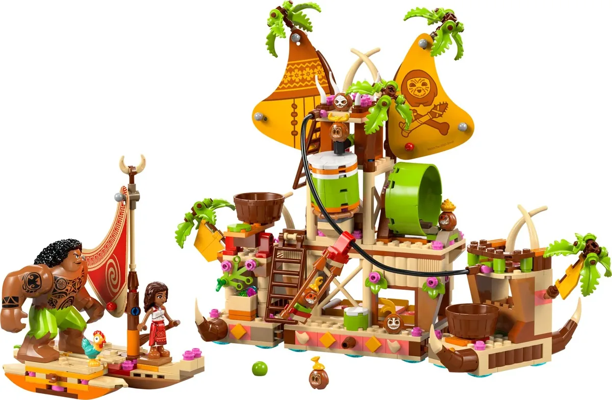 LEGO Disney Kakamora Barge 43258: the tusked barge with coconut sails beside Moana and Maui on a small boat