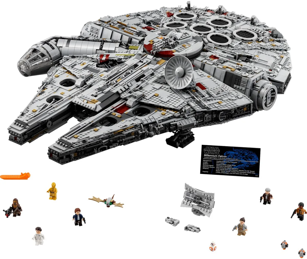 LEGO Ultimate Collector Series Millennium Falcon 75192 with its display plaque and the crew minifigures laid out in front
