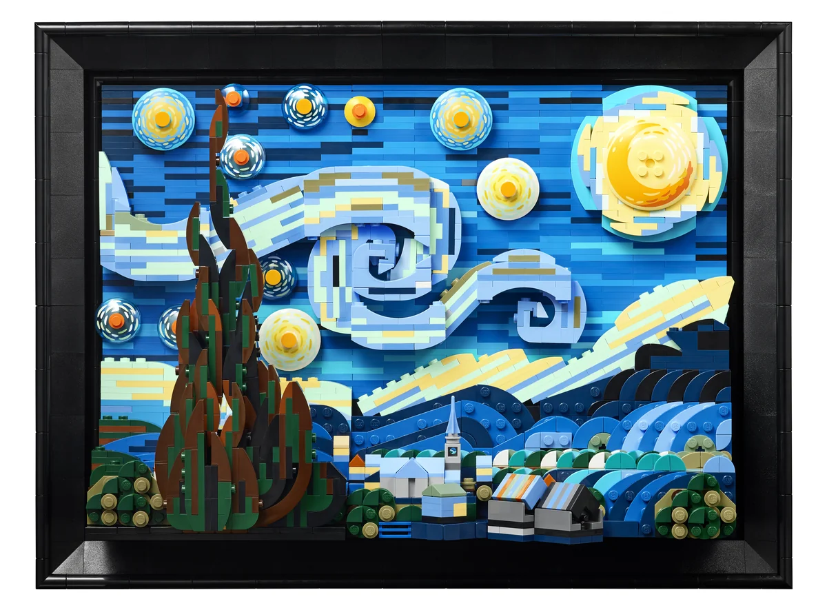 LEGO The Starry Night 21333 seen straight on: a swirling blue sky with a yellow moon and stars, a dark cypress tree and a small village