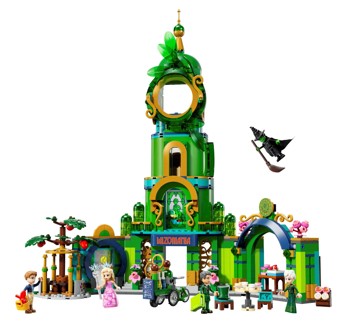 LEGO Wicked Welcome to Emerald City 75684, a tall green tower building with a clock face, shops at street level, trees and mini-doll figures
