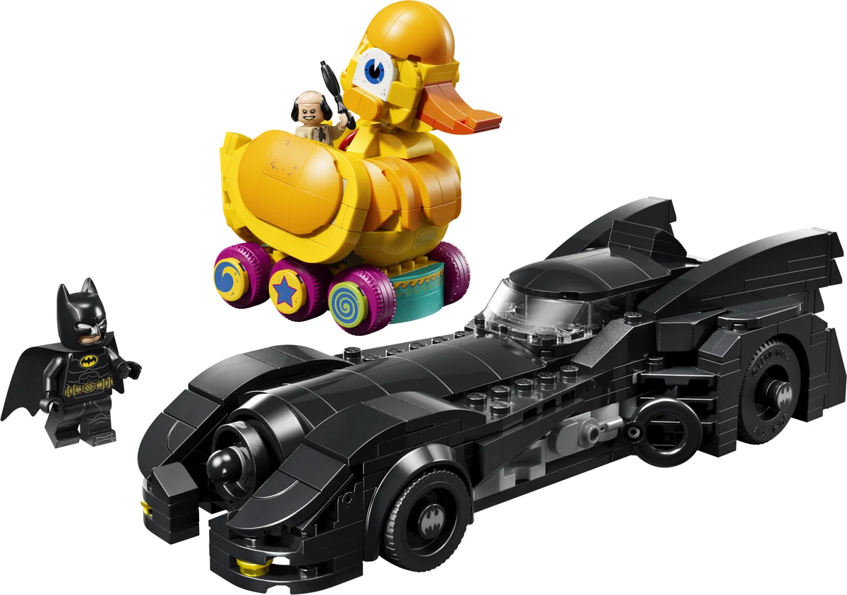LEGO DC Batman Returns Batmobile & Duck 67008, a black Batmobile with a Batman minifigure next to a yellow duck vehicle driven by the Penguin