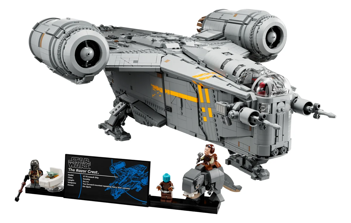 LEGO Star Wars UCS The Razor Crest 75331, a grey gunship with two large engines and yellow stripes, with a display plaque and minifigures